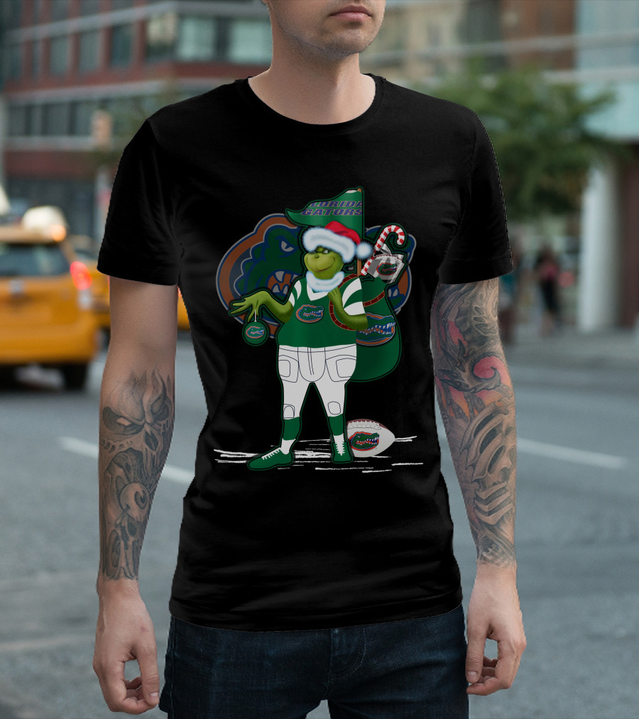 Grinchxmas Wearing Santa Hat Florida Gators With Gator Logo And Candy Cane T-Shirt