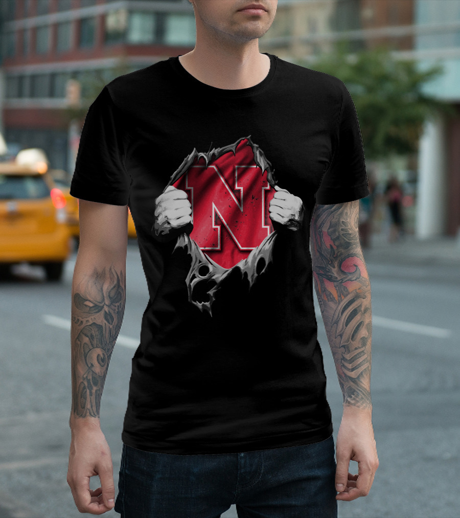 Torn Nebraska Huskers Bold N Emblem Peeking Through Ripped T-Shirt