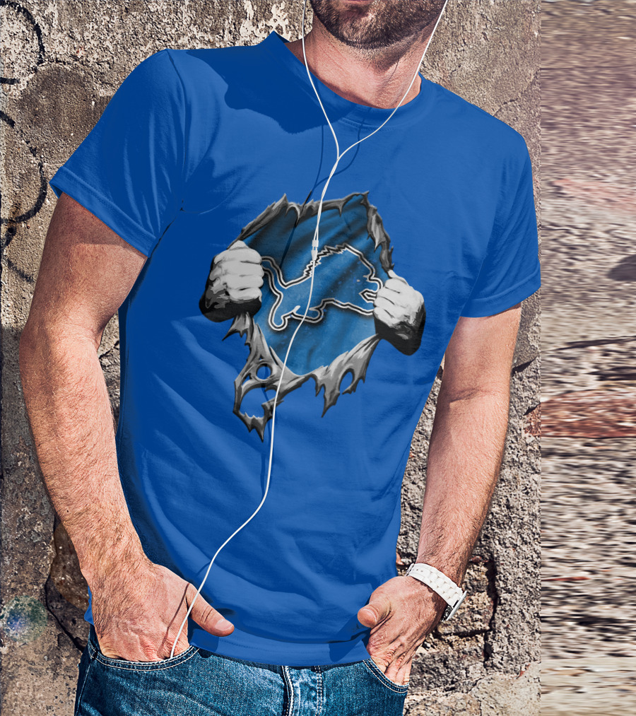 Torn Skin Revealing Detroit Lions Emblem On Blue T-Shirt