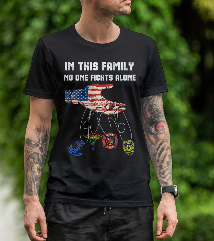 In This Family No One Fights Alone Veteran Firefighter American Flag Anchor EMT Badge T-Shirt