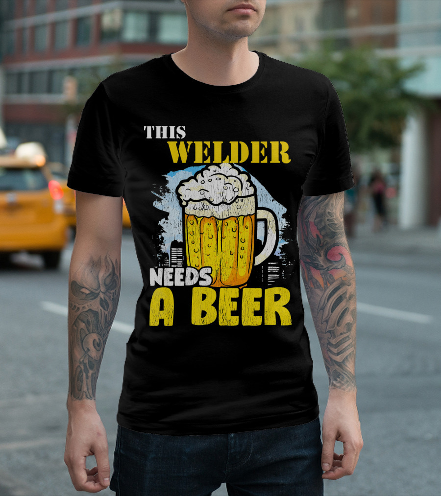 THIS WELDER NEEDS A BEER WITH FOAMY BEER MUG OVER CITY BACKDROP T-Shirt