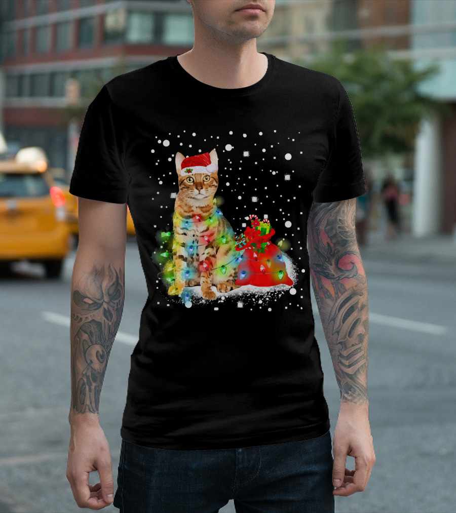 Bengal Cat With Christmas Hat And Colorful Lights In Snowy Holiday Scene T-Shirt