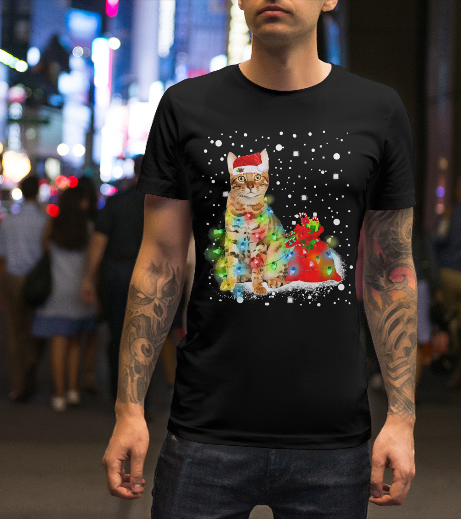 Bengal Cat With Christmas Hat And Colorful Lights In Snowy Holiday Scene T-Shirt
