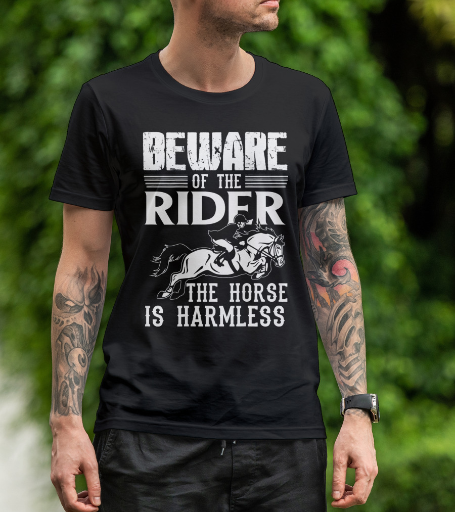 BEWARE OF THE RIDER THE HORSE IS HARMLESS T-Shirt