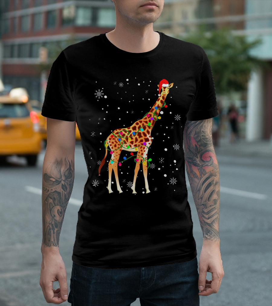 Giraffe Wrapped in Christmas Lights Wearing Santa Hat with Snowflakes T-Shirt