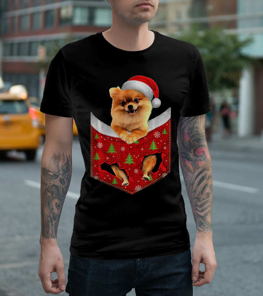 Pomeranian Dog In Christmas Pocket With Santa Hat And Festive T-Shirt