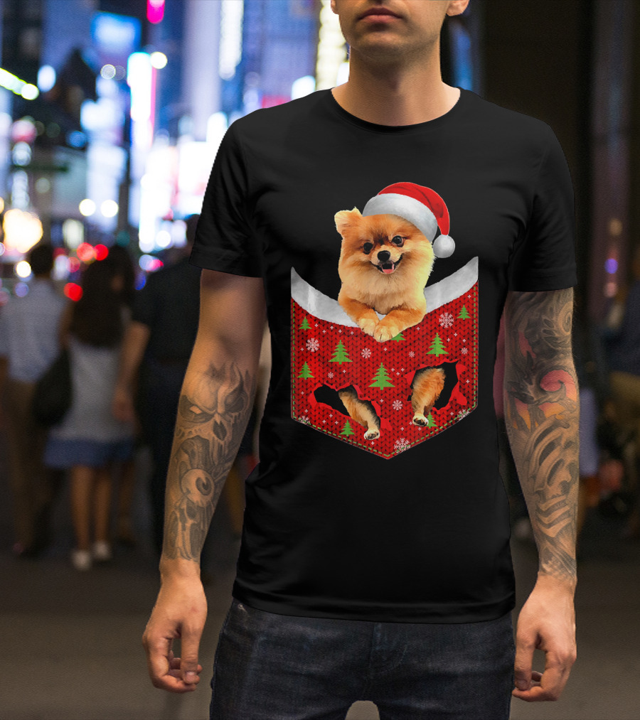 Pomeranian Dog In Christmas Pocket With Santa Hat And Festive T-Shirt