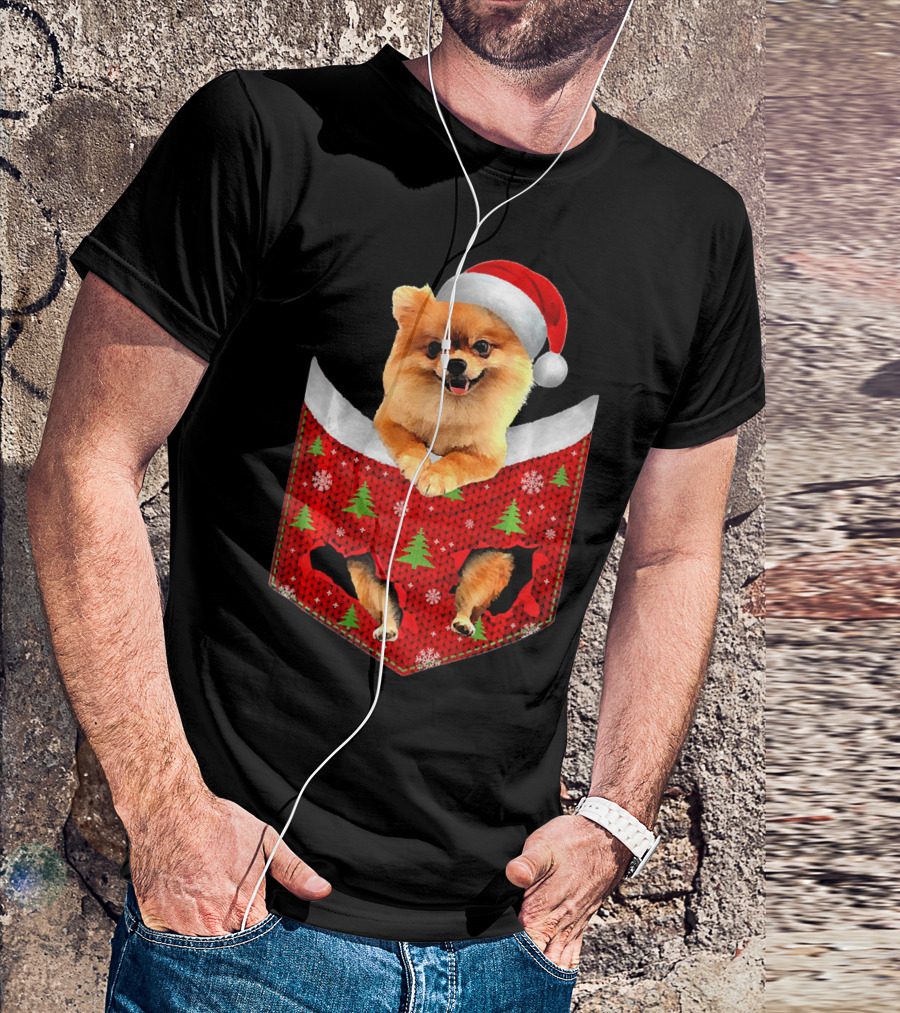 Pomeranian Dog In Christmas Pocket With Santa Hat And Festive T-Shirt