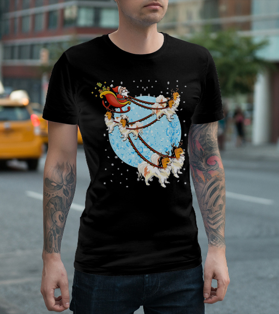 Santa Claus Sleigh Pulled by Papillon Dogs Under Starry Sky and Full Moon T-Shirt