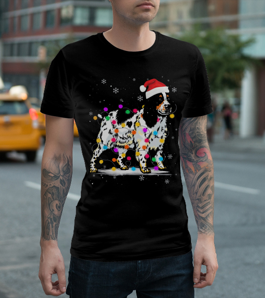 Cocker Spaniel Dog In Santa Hat Wrapped In Colorful Christmas Lights With Snowflakes T-Shirt