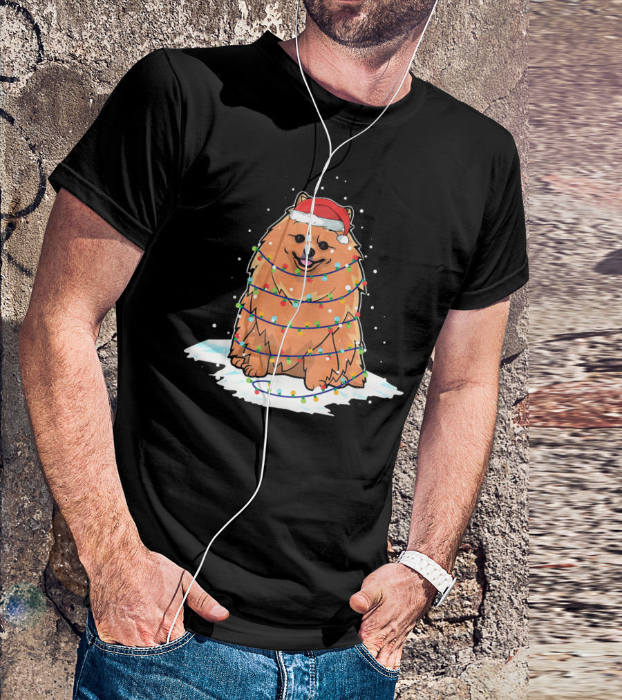 Pomeranian Santa Wrapped In Christmas Lights On Snowy Ground T-Shirt