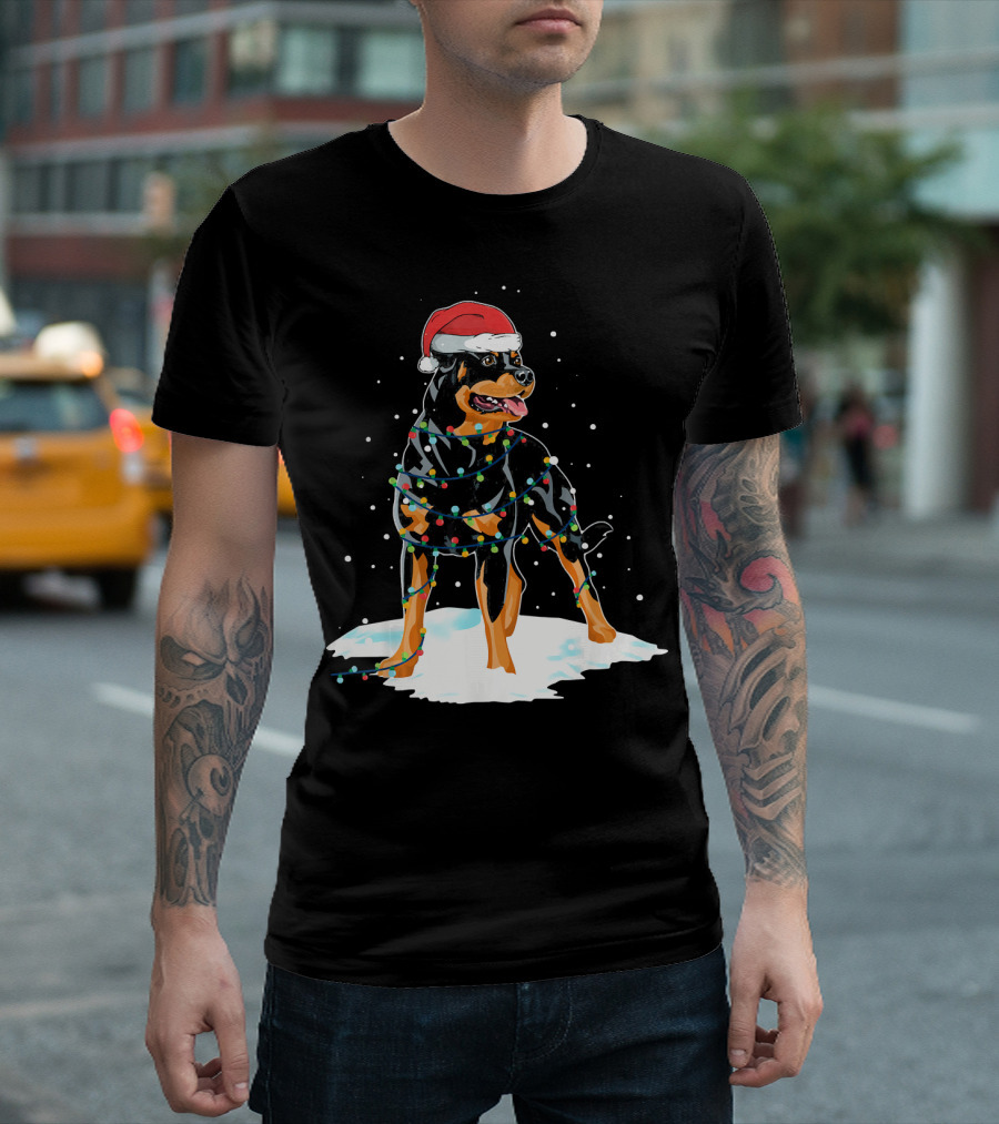 Rottweiler Santa Wrapped In Christmas Lights On Snow T-Shirt