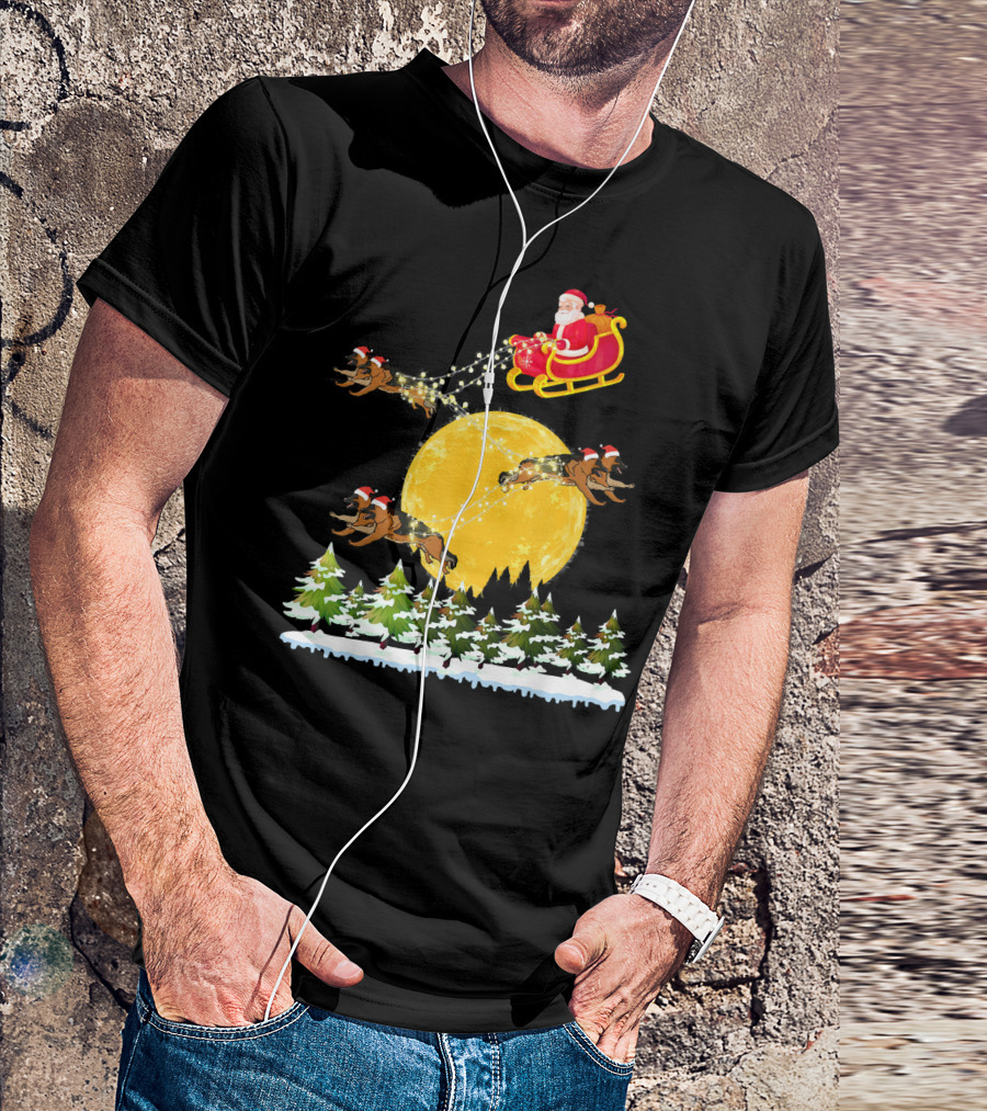 Santa Claus In Sled With German Shepherds Flying Over Moonlit Forest T-Shirt