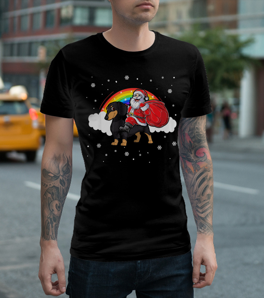 Santa Claus Riding Rainbow Dachshund with Snowflakes and Clouds T-Shirt