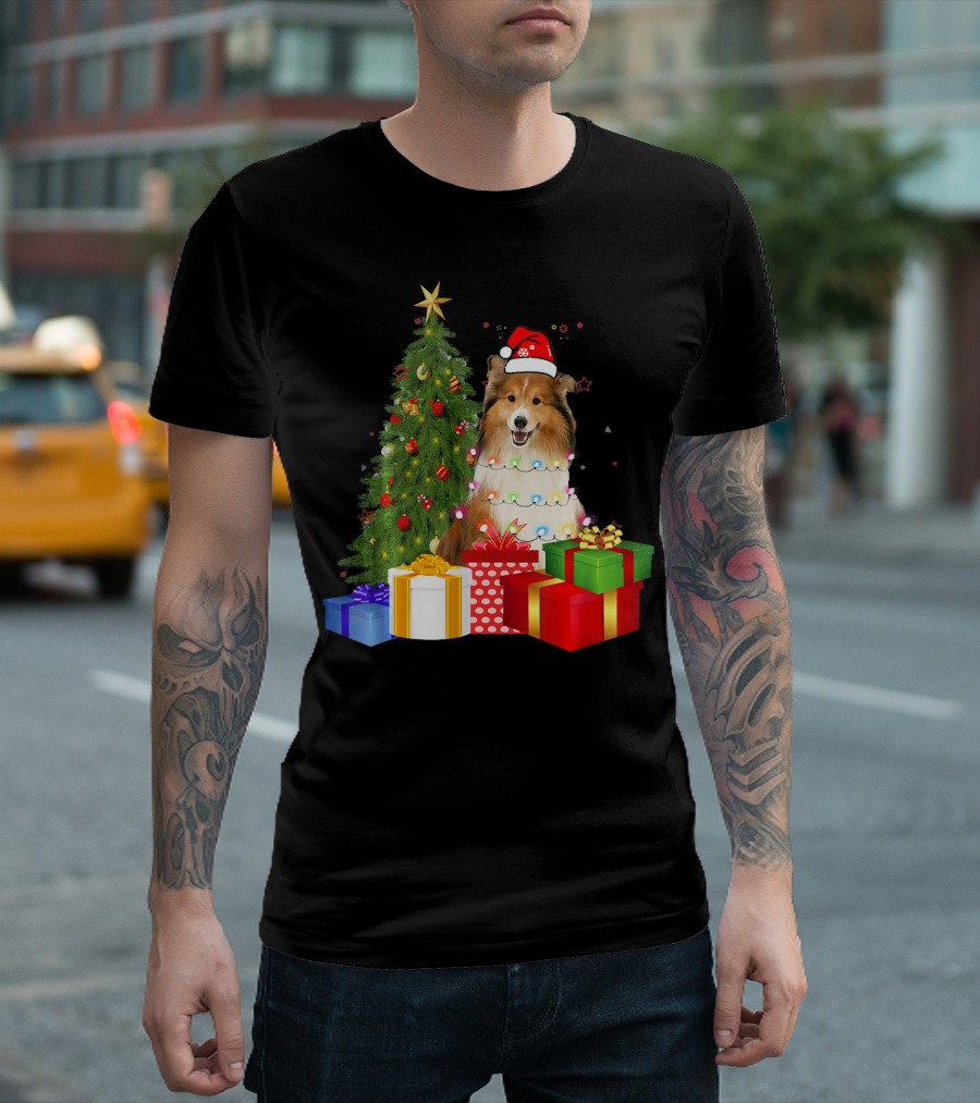 Santa Sheltie Dog Wrapped In Christmas Tree Lights With Presents T-Shirt