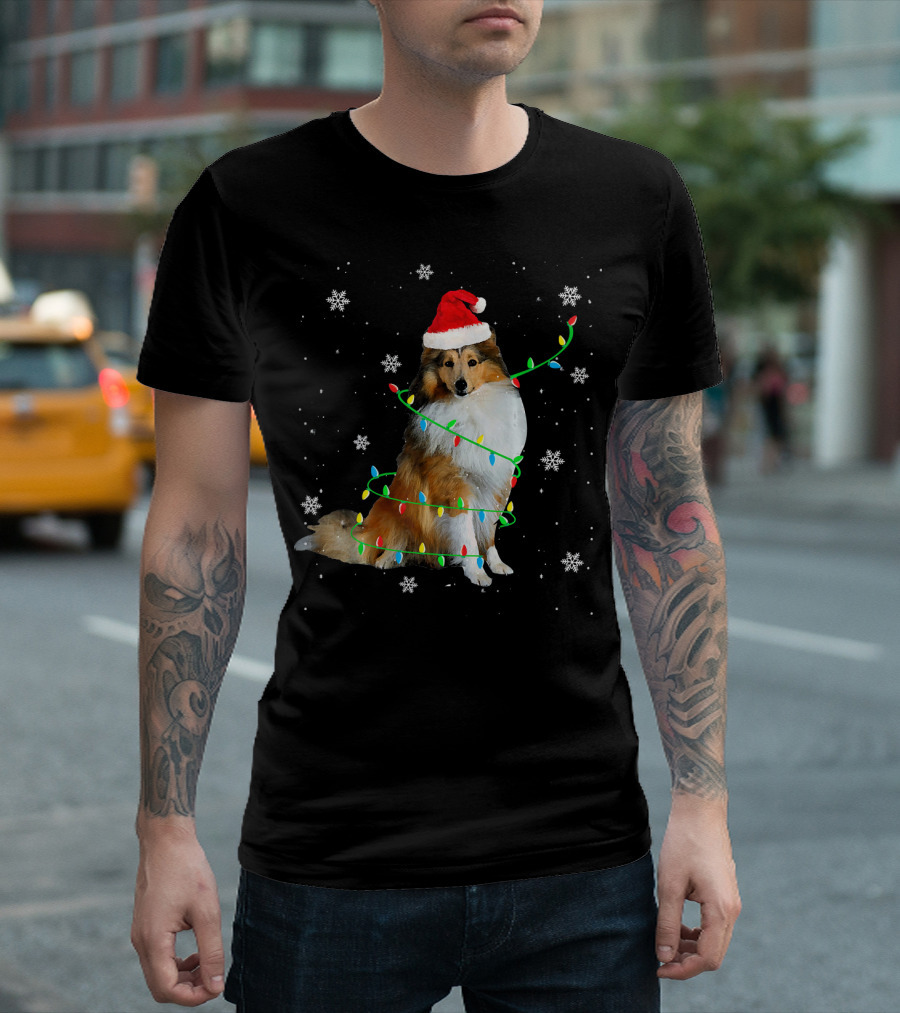 Shetland Sheepdog Wrapped in Christmas Lights with Santa Hat and Snowflakes T-Shirt