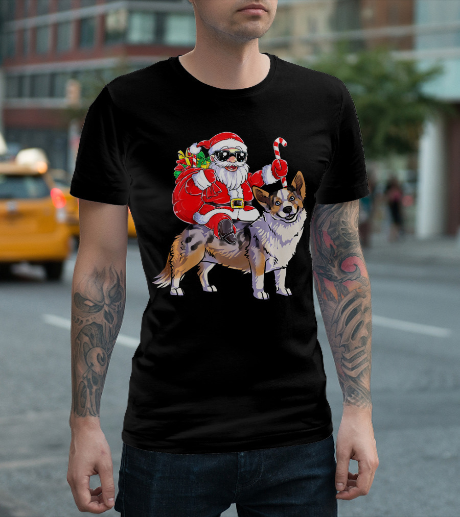 Santa Claus With Goggles Riding Cardigan Welsh Corgi Holding Candy Cane T-Shirt