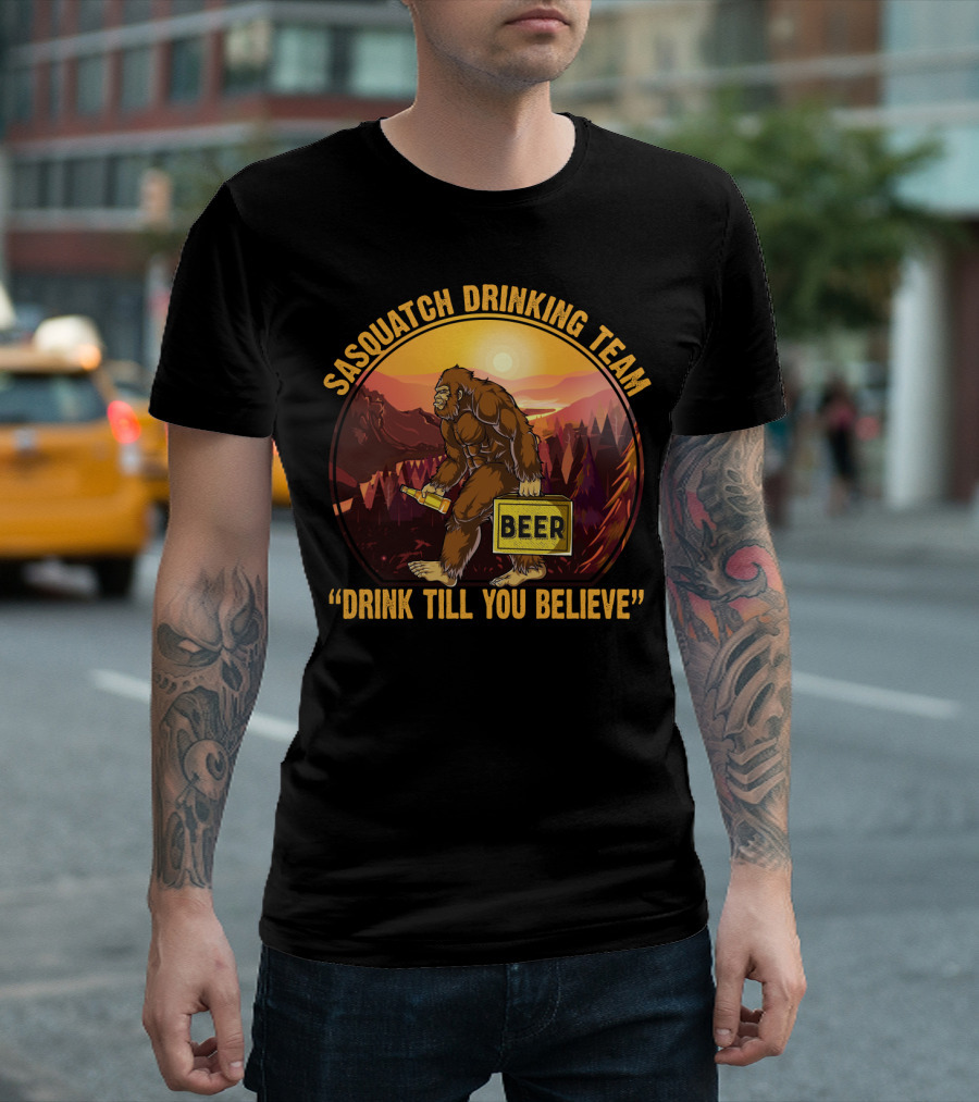 Sasquatch Drinking Team Beer Wilderness Sunset Funny Bigfoot Drink Till You Believe T-Shirt