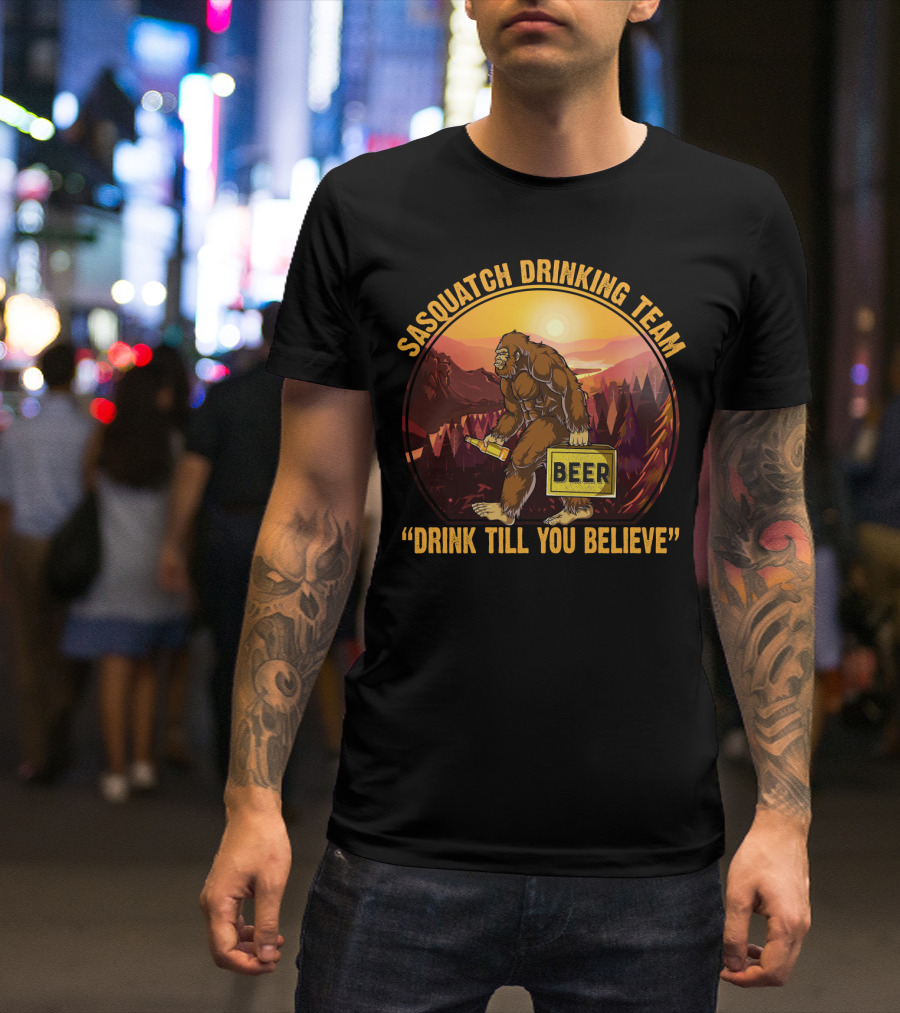Sasquatch Drinking Team Beer Wilderness Sunset Funny Bigfoot Drink Till You Believe T-Shirt