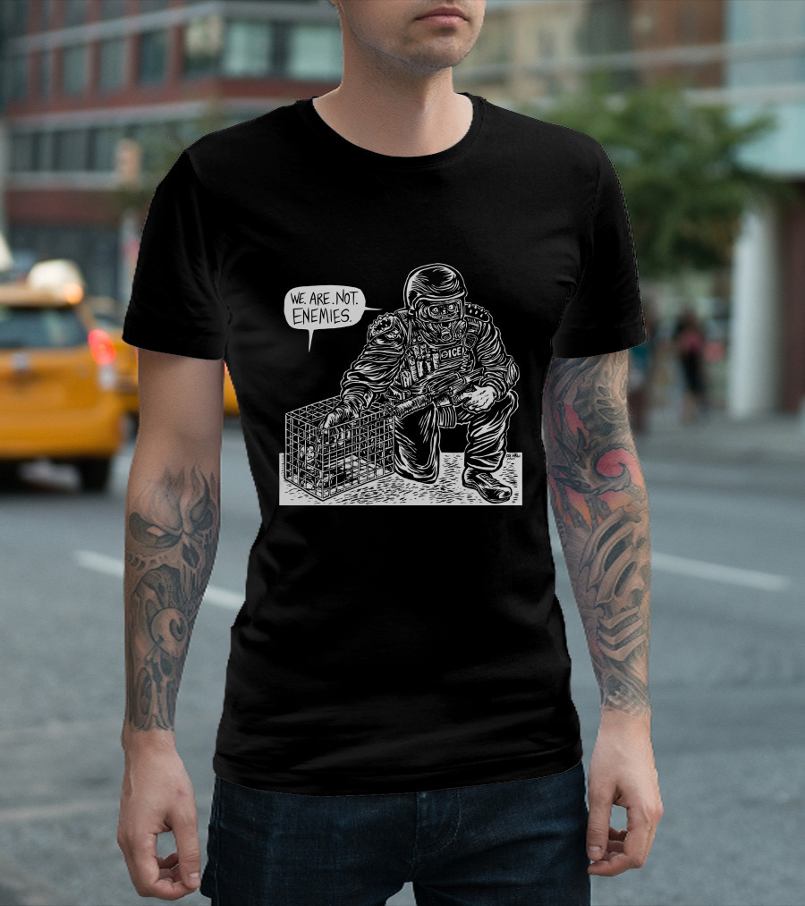 We Are Not Enemies Eli Valley Police Figure Kneeling with Cage T-Shirt