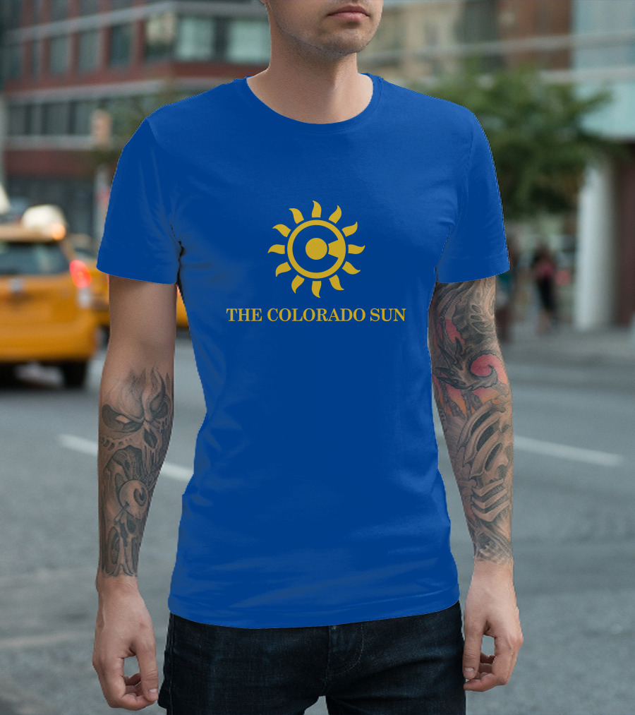 The Colorado Sun Merch Colorado Sun Logo Yellow Sunburst Blue Background T-Shirt