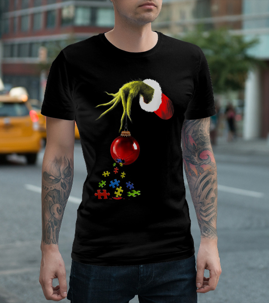 Grinch Hand Holding Red Ornament with Autism Puzzle Pieces T-Shirt