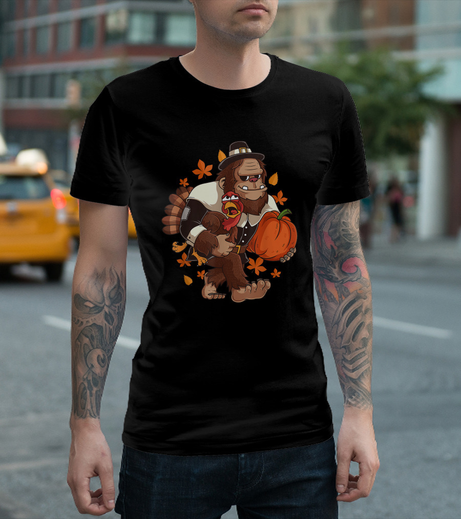 Bigfoot Pilgrim Holding Pumpkin With Turkey And Autumn Leaves Thanksgiving Fall T-Shirt