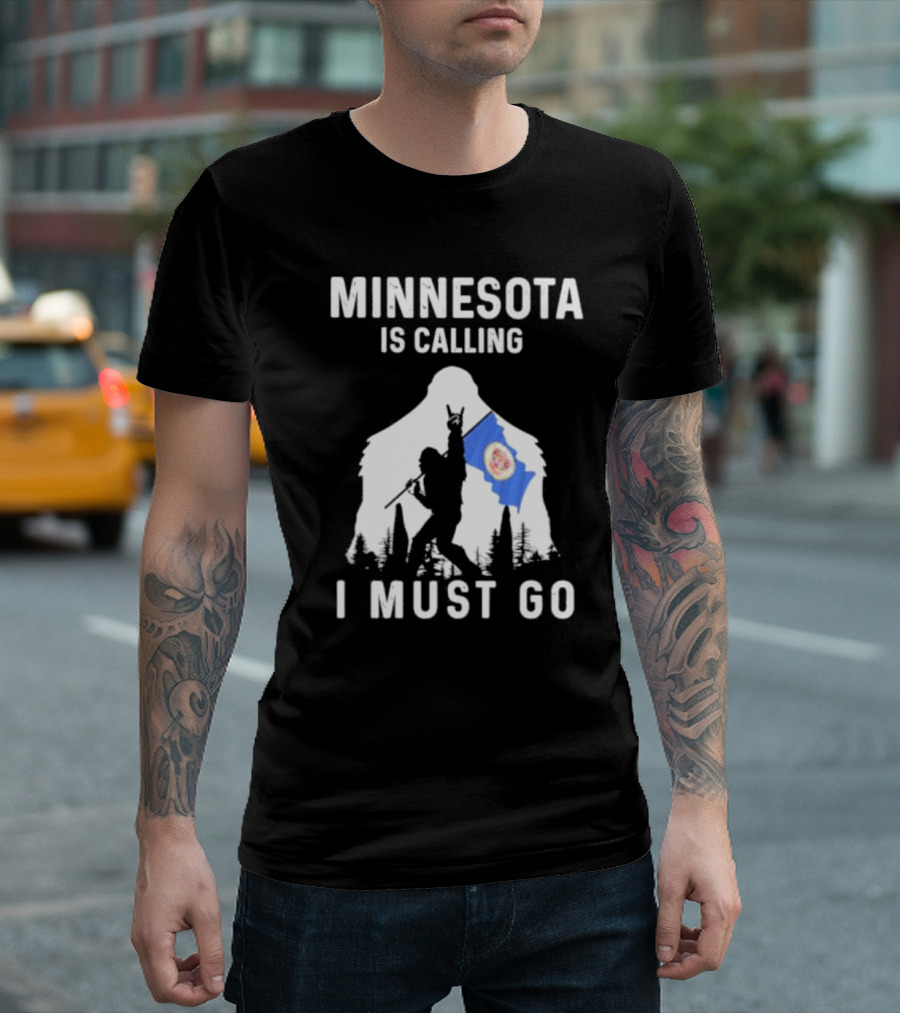 Minnesota Is Calling I Must Go Bigfoot Silhouette with Flag T-Shirt