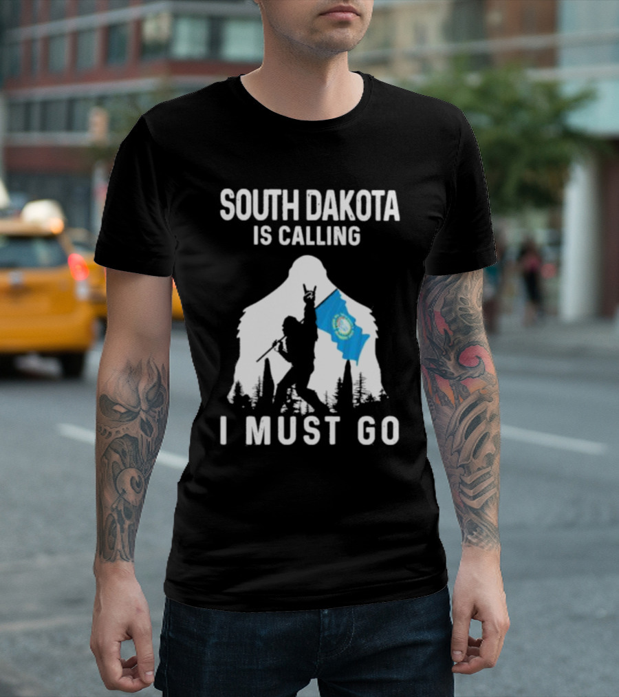 South Dakota Is Calling I Must Go Bigfoot Holding South Dakota Flag T-Shirt