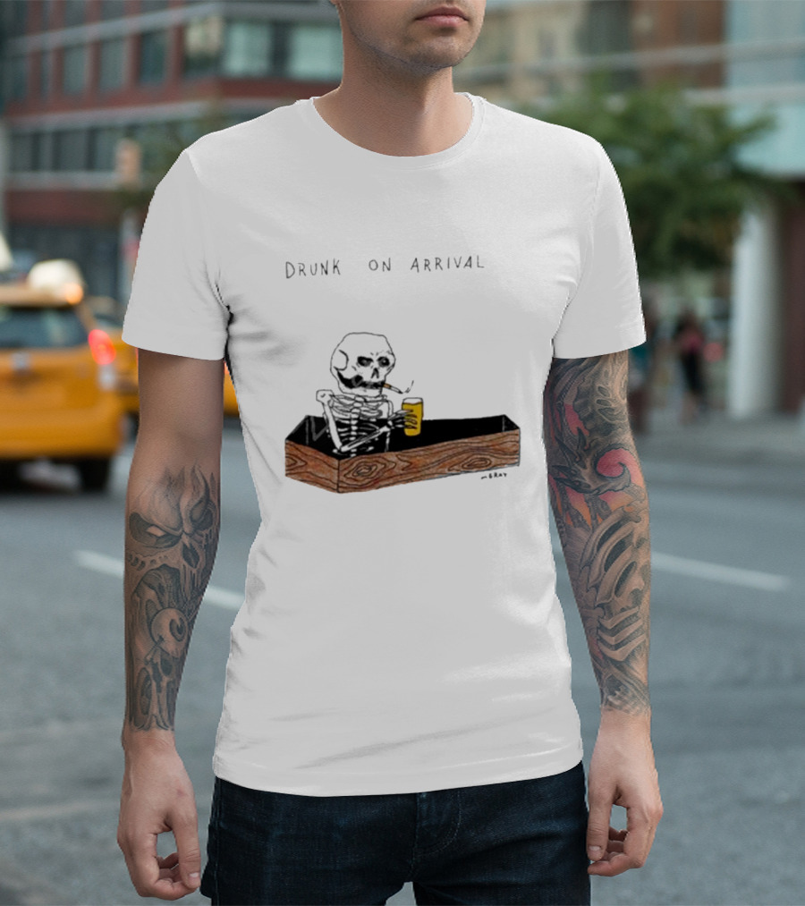 Matt Gray Drunk On Arrival Skeleton in Coffin Holding Drink T-Shirt
