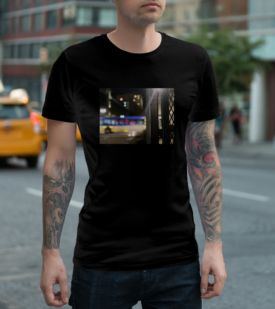 Bus Passing Through Nighttime Urban Scene Behind Street Fence in Downtown Portland T-Shirt