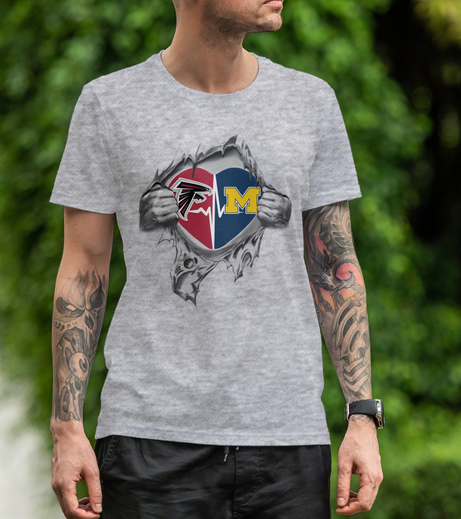 Heart Of Michigan Wolverines And Atlanta Falcons Logos On Torn Fabric T-Shirt