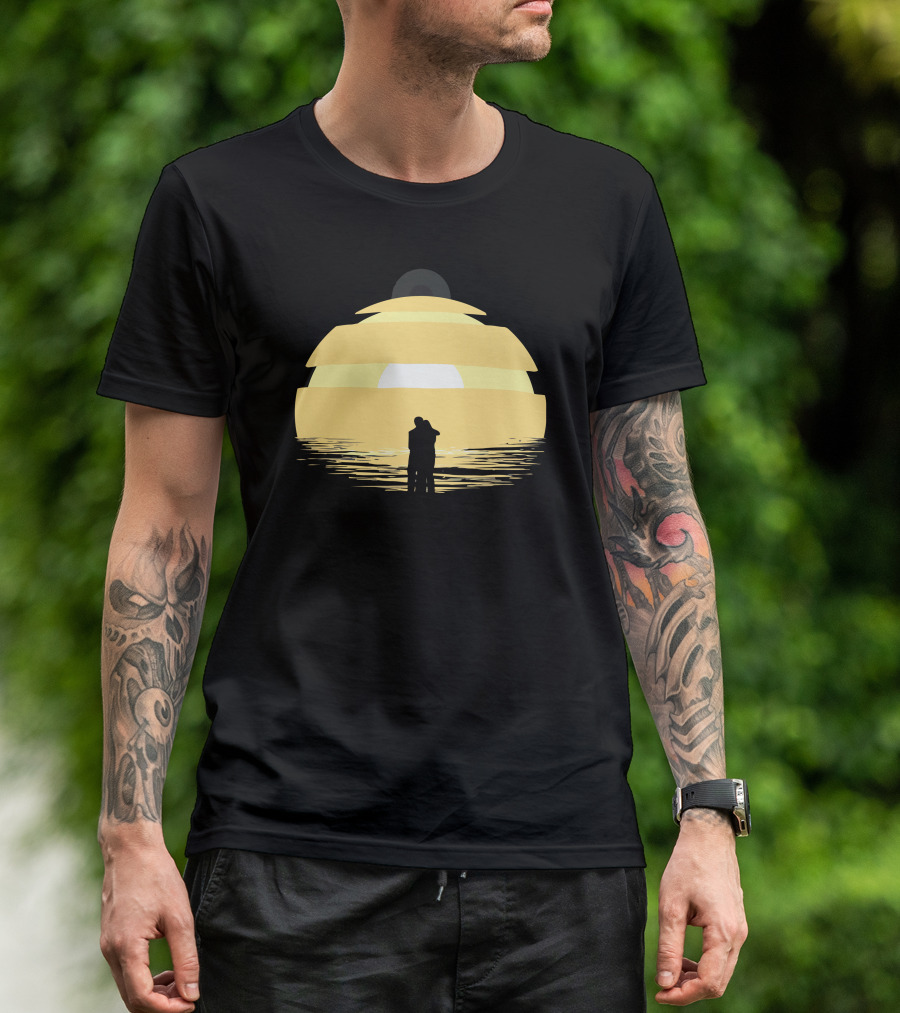 Two Rogues Embracing At Sunset Over Ocean Horizon T-Shirt