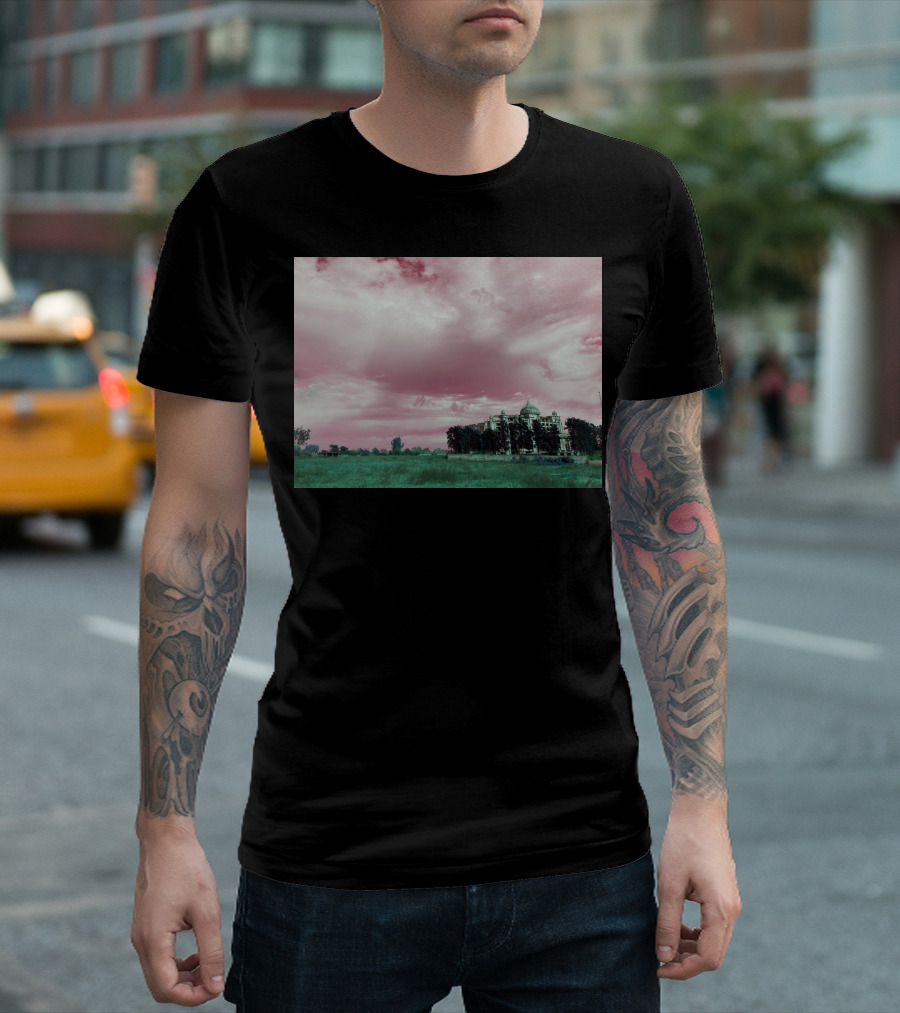 Pink Sky Over Majestic Building and Lush Green Landscape T-Shirt