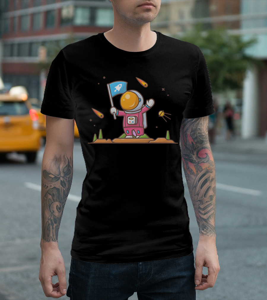 Cute Astronaut Holding Flag on Planet with Satellite and Comets T-Shirt