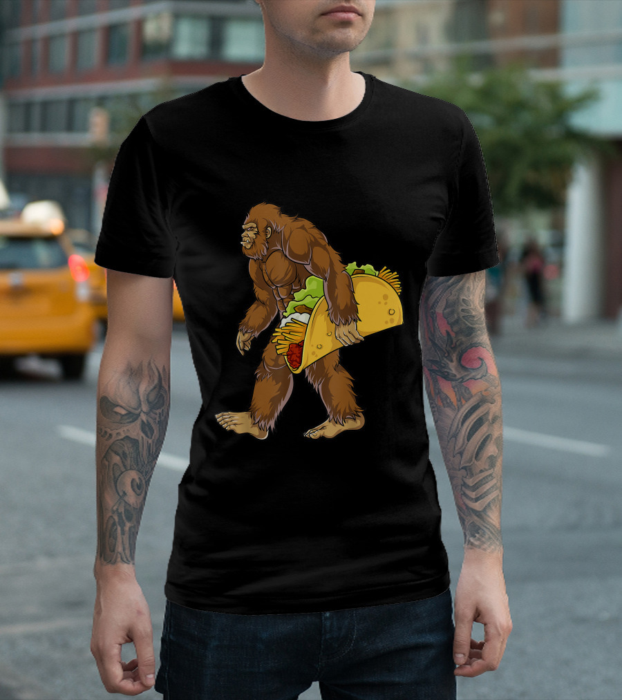 Bigfoot Walking With Giant Taco Filled With Lettuce Cheese And Meat T-Shirt