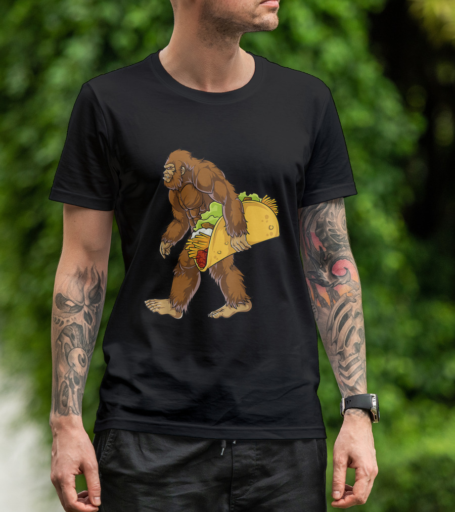 Bigfoot Walking With Giant Taco Filled With Lettuce Cheese And Meat T-Shirt