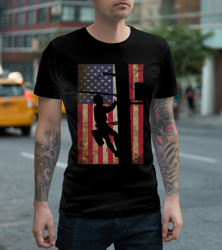 Lineman Climbing Electric Pole Against American Flag Background T-Shirt
