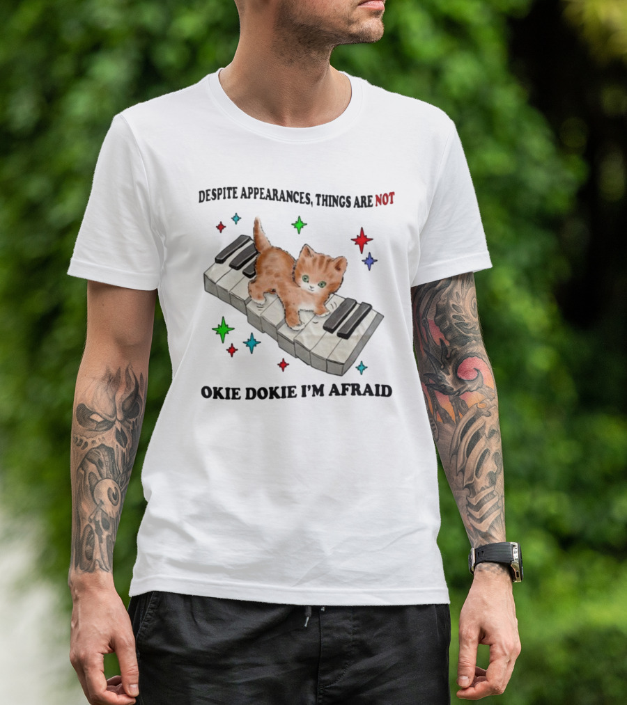 Despite Appearances Things Are Not Okie Dokie I'm Afraid Cat On Piano Keys With Colorful Stars T-Shirt