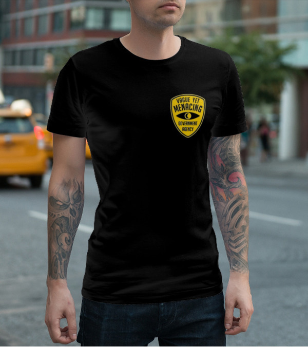 Vague Yet Menacing Government Agency Yellow Badge With Eye T-Shirt