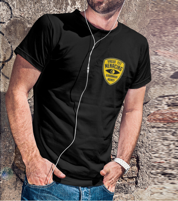 Vague Yet Menacing Government Agency Yellow Badge With Eye T-Shirt