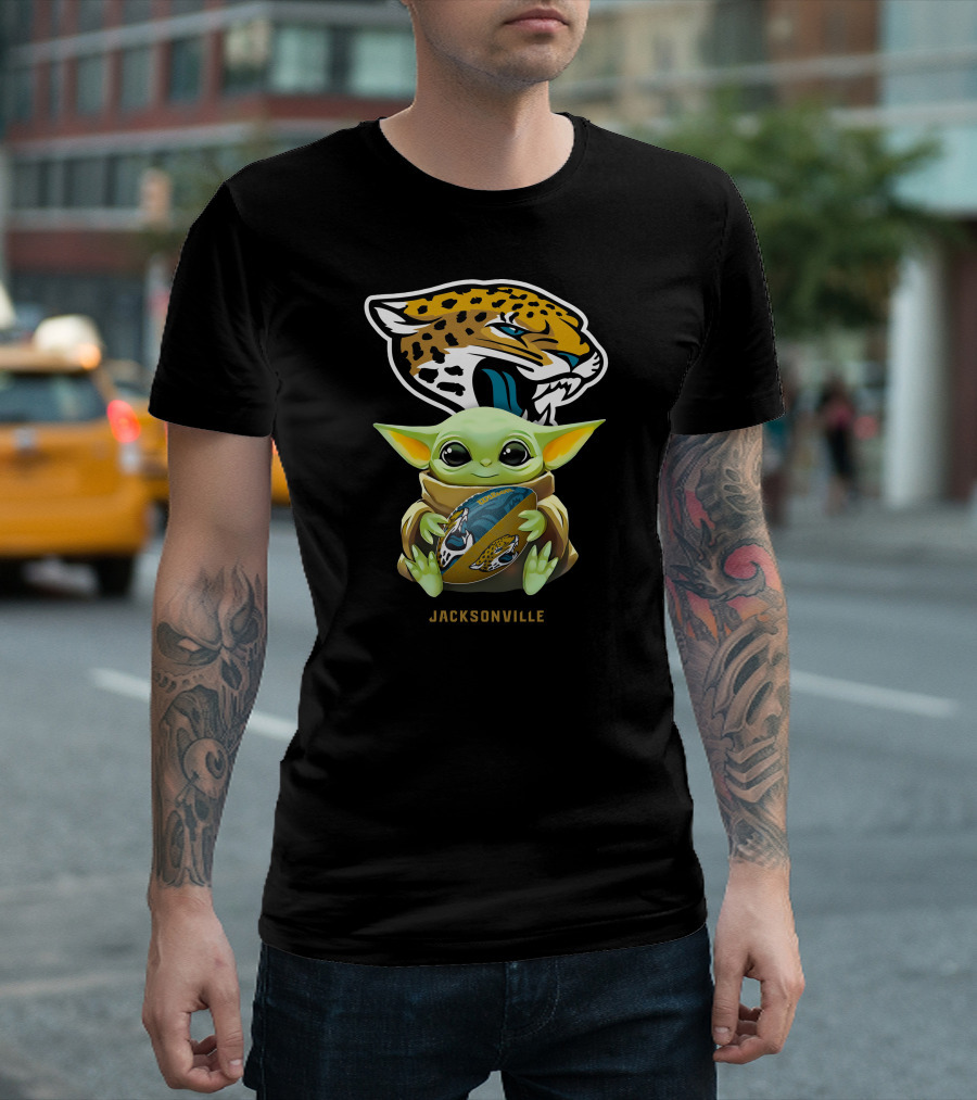 Grogu Holding Football with Jacksonville Jaguars T-Shirt