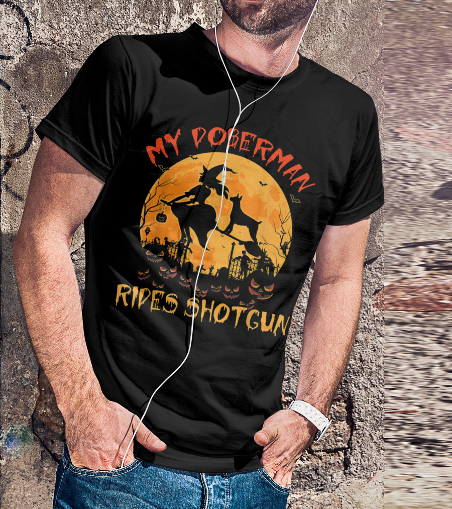My Doberman Rides Shotgun Halloween Witch And Pumpkins Moon Scene T-Shirt