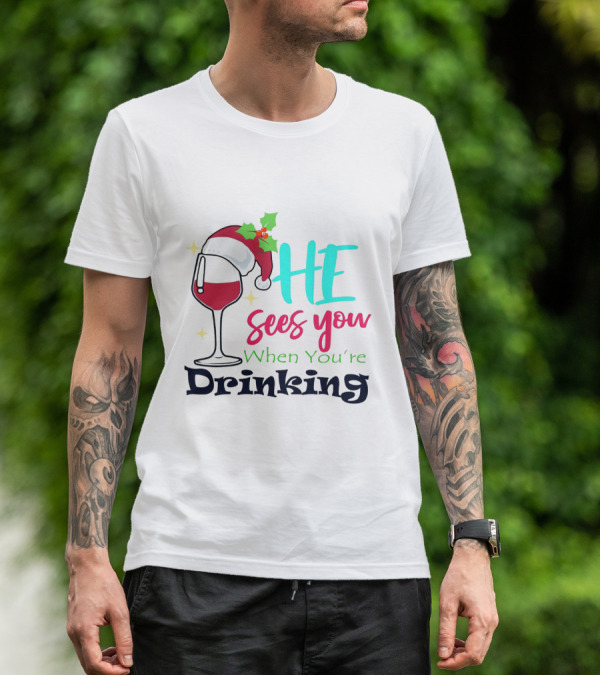 Santa Hat On Wine Glass With 'He Sees You When You're Drinking' Christmas Festive T-Shirt