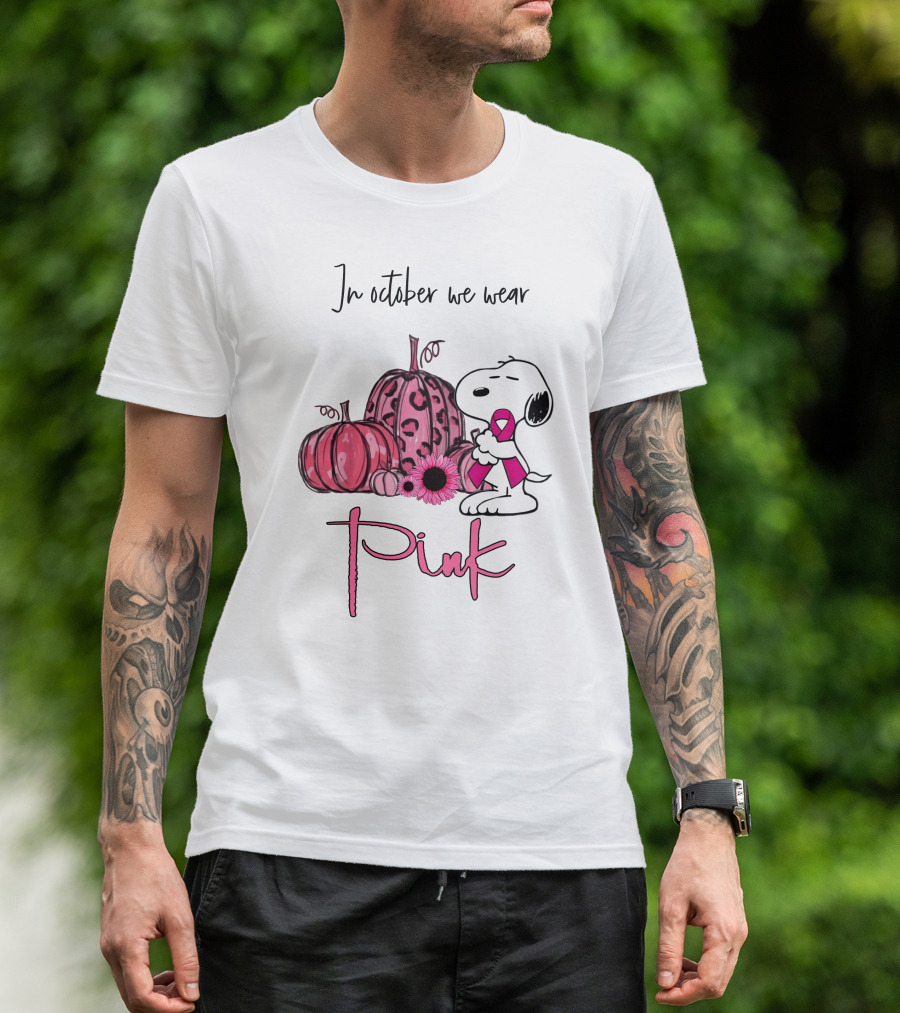 In October We Wear Pink With Peanuts Character Holding Ribbon And Pumpkins T-Shirt