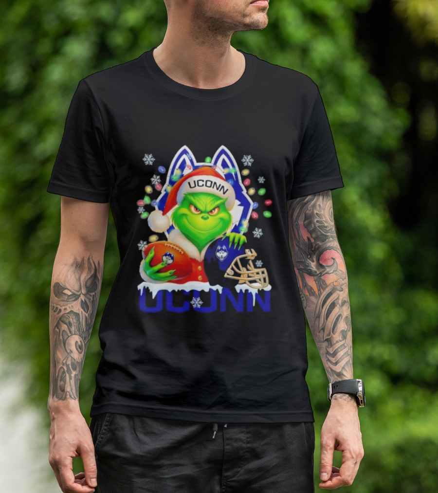 Grinch Wearing Santa Hat With UConn Huskies Football And Helmet Merry Christmas T-Shirt