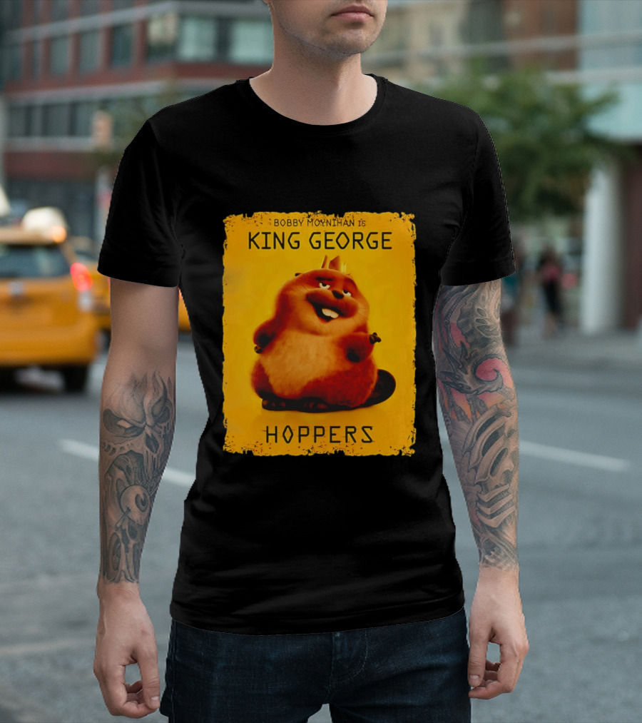 Bobby Moynihan Is King George Hoppers Smiling Cartoon Character With Crown On Orange T-Shirt