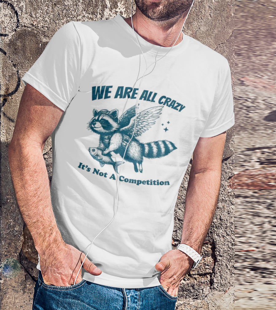 Raccoon With Wings Holding Fish We Are All Crazy It's Not A Competition T-Shirt