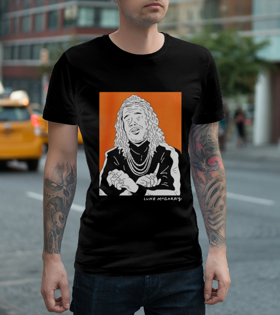 Luke McGarry Cartoon Character With Long Hair And Chains On Orange T-Shirt