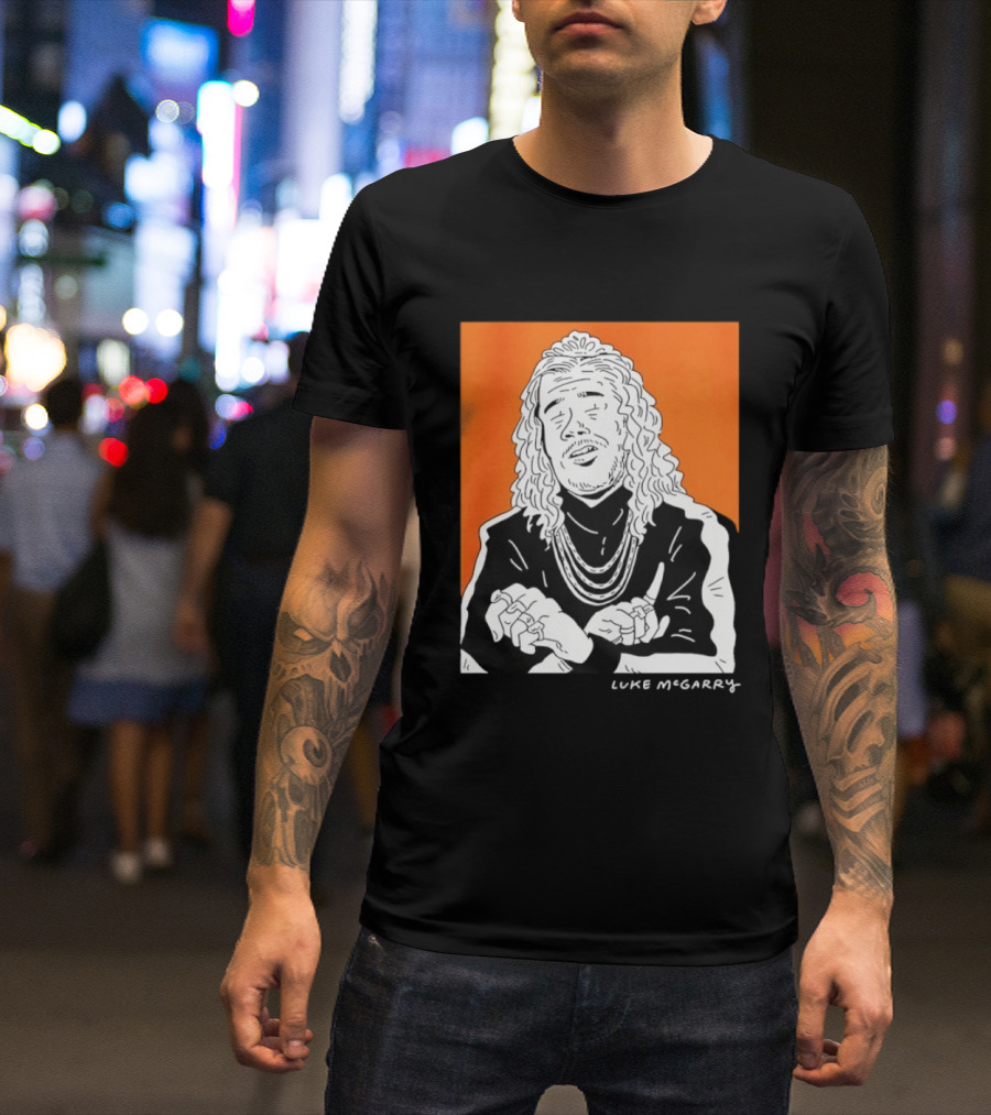 Luke McGarry Cartoon Character With Long Hair And Chains On Orange T-Shirt